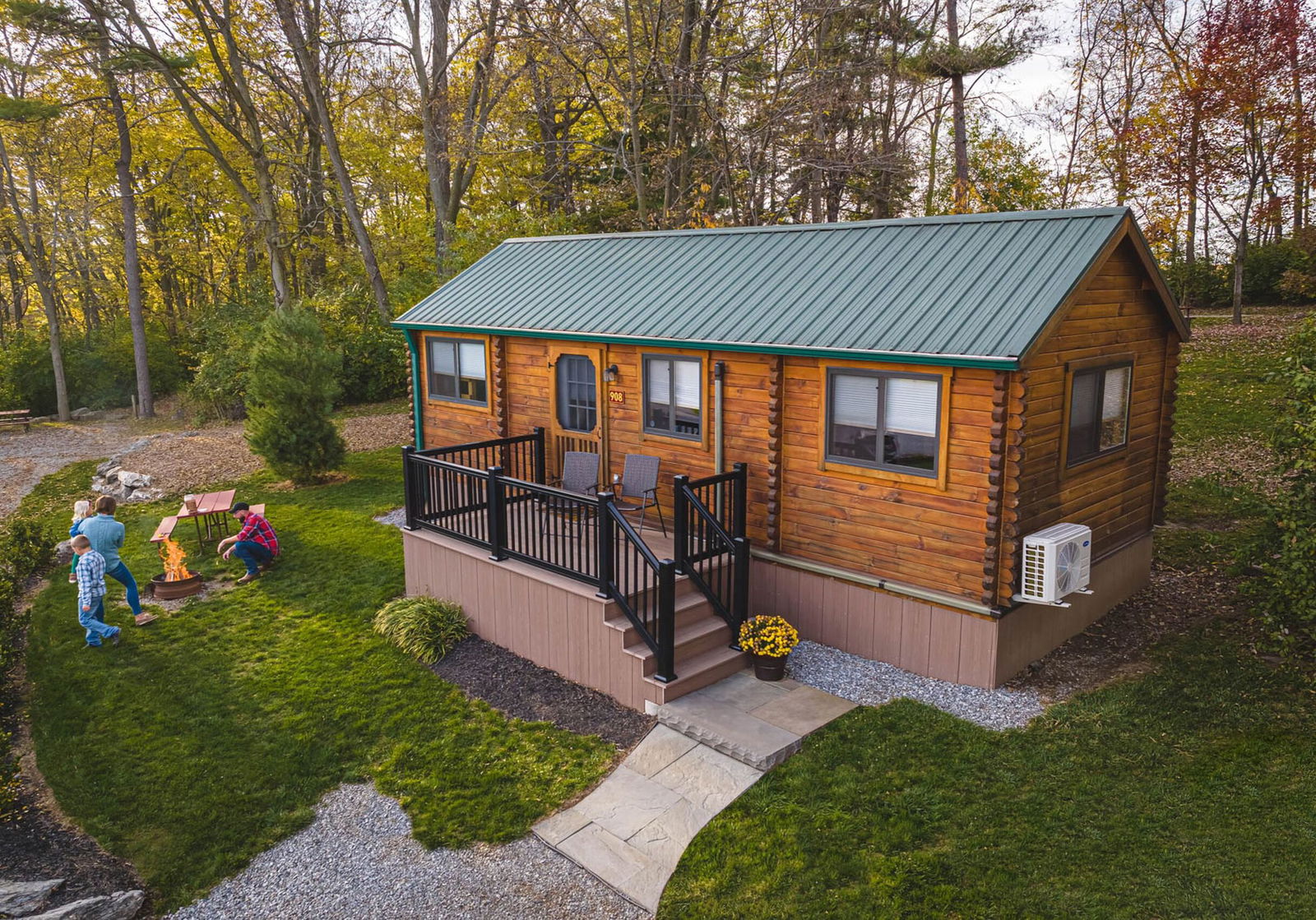 Country Acres cabin exterior with campfire